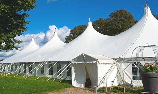 sleek white portable restrooms for events, providing a reliable and functional option for those in need in Juno Beach